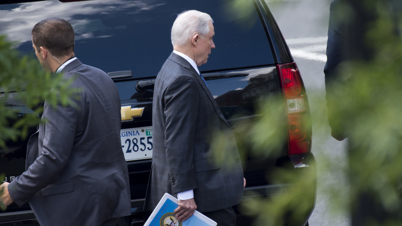 Attorney General Jeff Sessions leaves the White House in Washington, D.C., on Wednesday. Sessions is traveling to El Salvador on Thursday to discuss gang violence with his counterparts there. (Saul Loeb/AFP/Getty Images)
