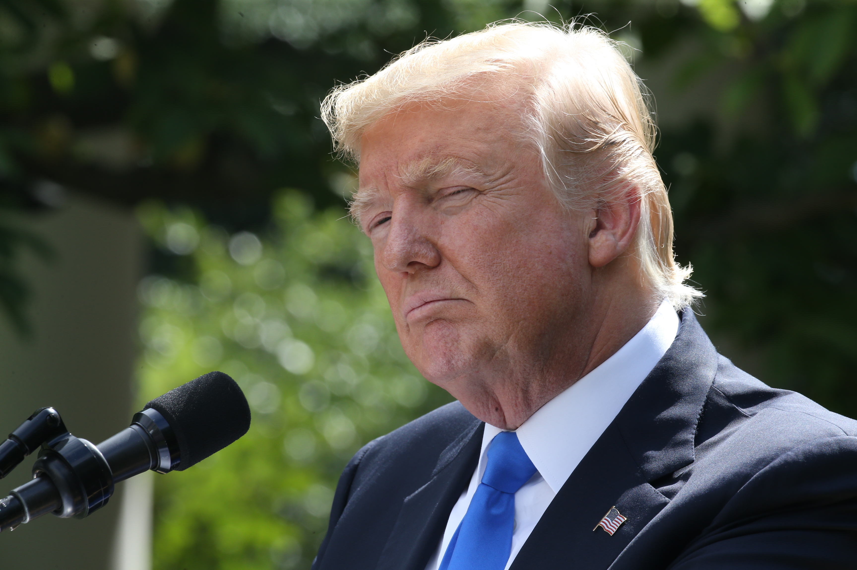 President Trump still hopes to force legislators back to the table to find a way to get rid of the Affordable Care Act, by any means possible. (Tasos Katopodis /AFP/Getty Images)
