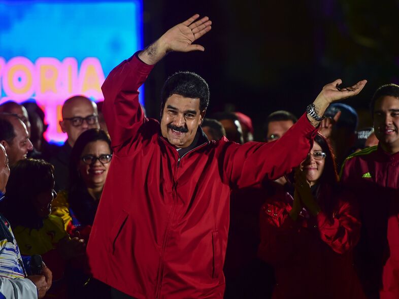 Venezuelan President Nicolas Maduro celebrates the results of Sunday's referendum to elect members of his constituent assembly. For this "fundamental assault on the freedoms of the Venezuelan people," the U.S. Treasury announced sanctions on Maduro on Monday. (Ronaldo Schemidt/AFP/Getty Images)