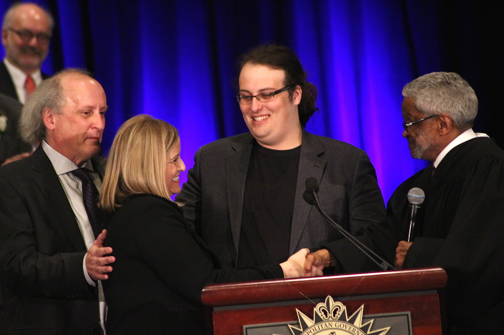 Mayor Megan Barry shakes hands with Judge Richard Dinkins at her inauguration in 2015. Her son, Max Barry (center), died last month of a drug overdose, his parents said. Mayor Barry intends to use her platform to "inspire and encourage other parents out there."