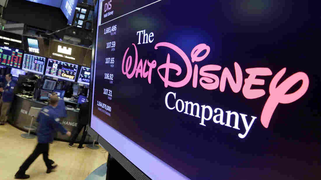 The Walt Disney Co. logo appears on a screen above the floor of the New York Stock Exchange on Monday.