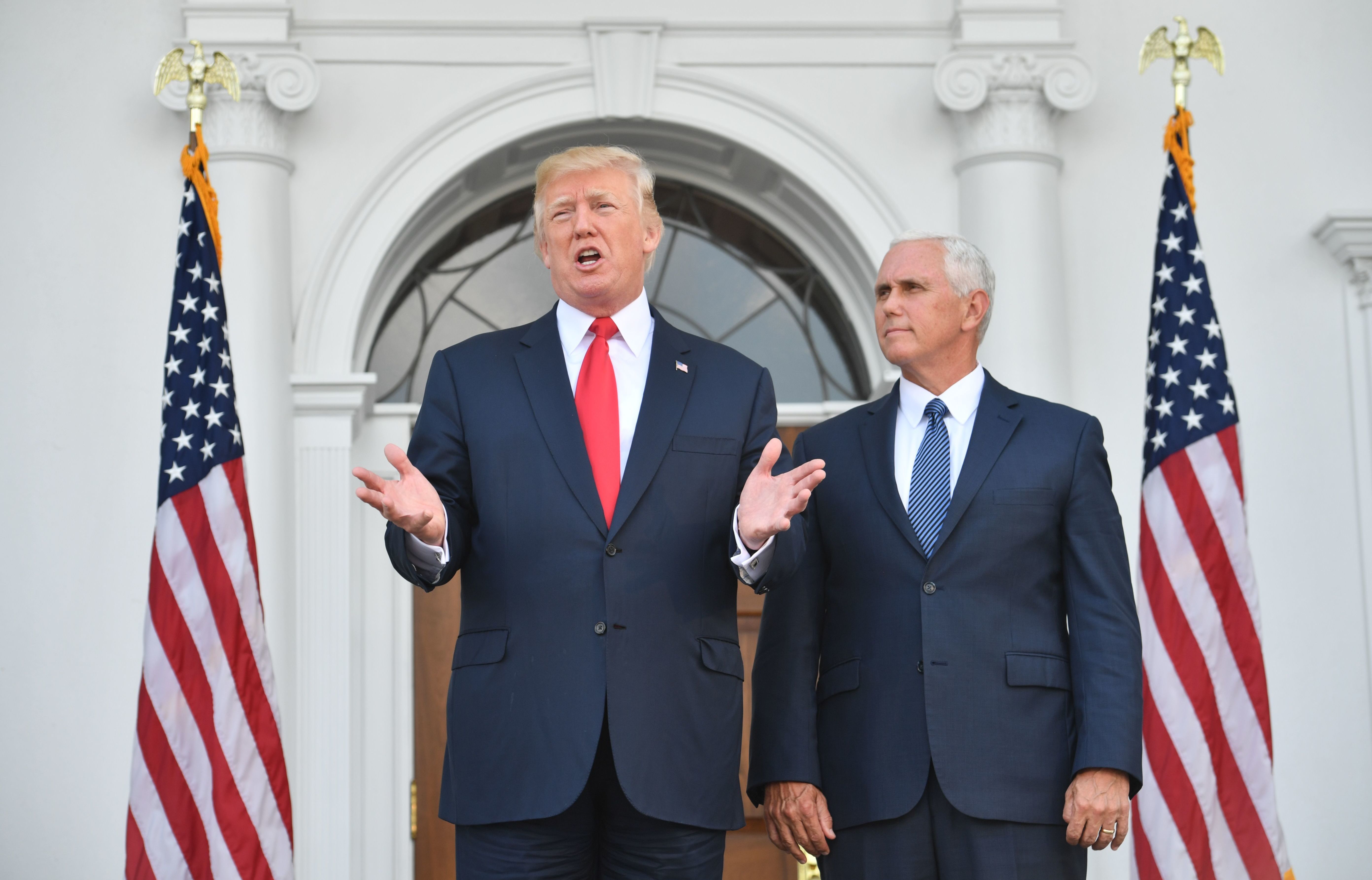 President Trump and Vice President Pence speak to the press on Thursday at the Trump National Golf Club in New Jersey before a security briefing. Trump said he would declare the opioid crisis a national emergency. (AFP/Getty Images)
