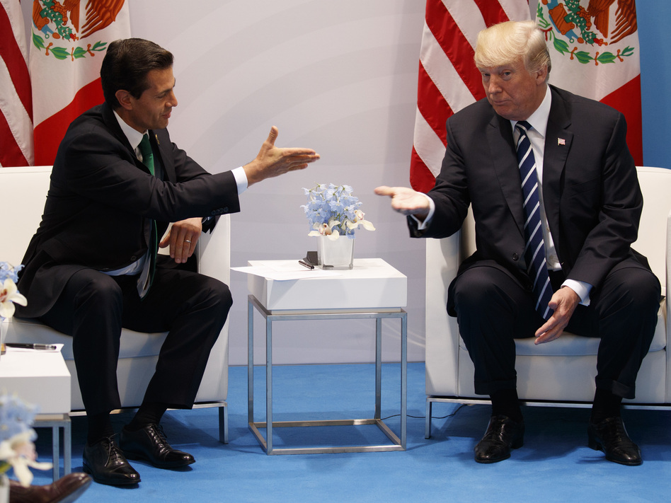 President Trump meets with Mexican President Enrique Peña Nieto at the Group of 20 summit in Hamburg, Germany, in July. Trump is pushing to renegotiate the North American Free Trade Agreement among their countries and Canada. (Evan Vucci/AP)