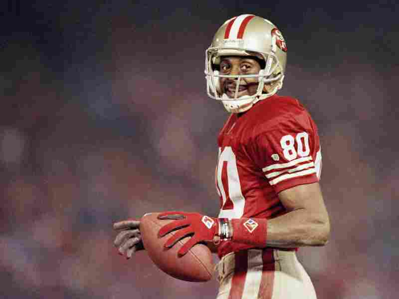 Jerry Rice smiles during a game on Dec. 3, 1994, at Candlestick Park in San Francisco.