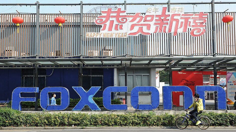 Wisconsin lawmakers are considering a $3 billion package of incentives to encourage Taiwanese electronics company Foxconn, which has had a presence in southern China, to build a factory in the state. (Stringer/AFP/Getty Images)
