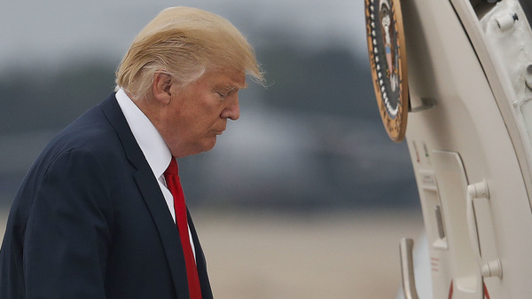 President Trump, seen here boarding Air Force One on Monday, has new criticism for business leaders who are leaving his manufacturing council.