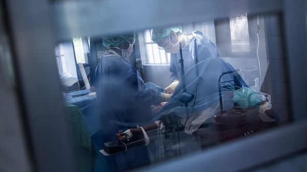 Health workers from Doctors Without Borders give emergency treatment to a newborn baby in Sierra Leone in 2014.