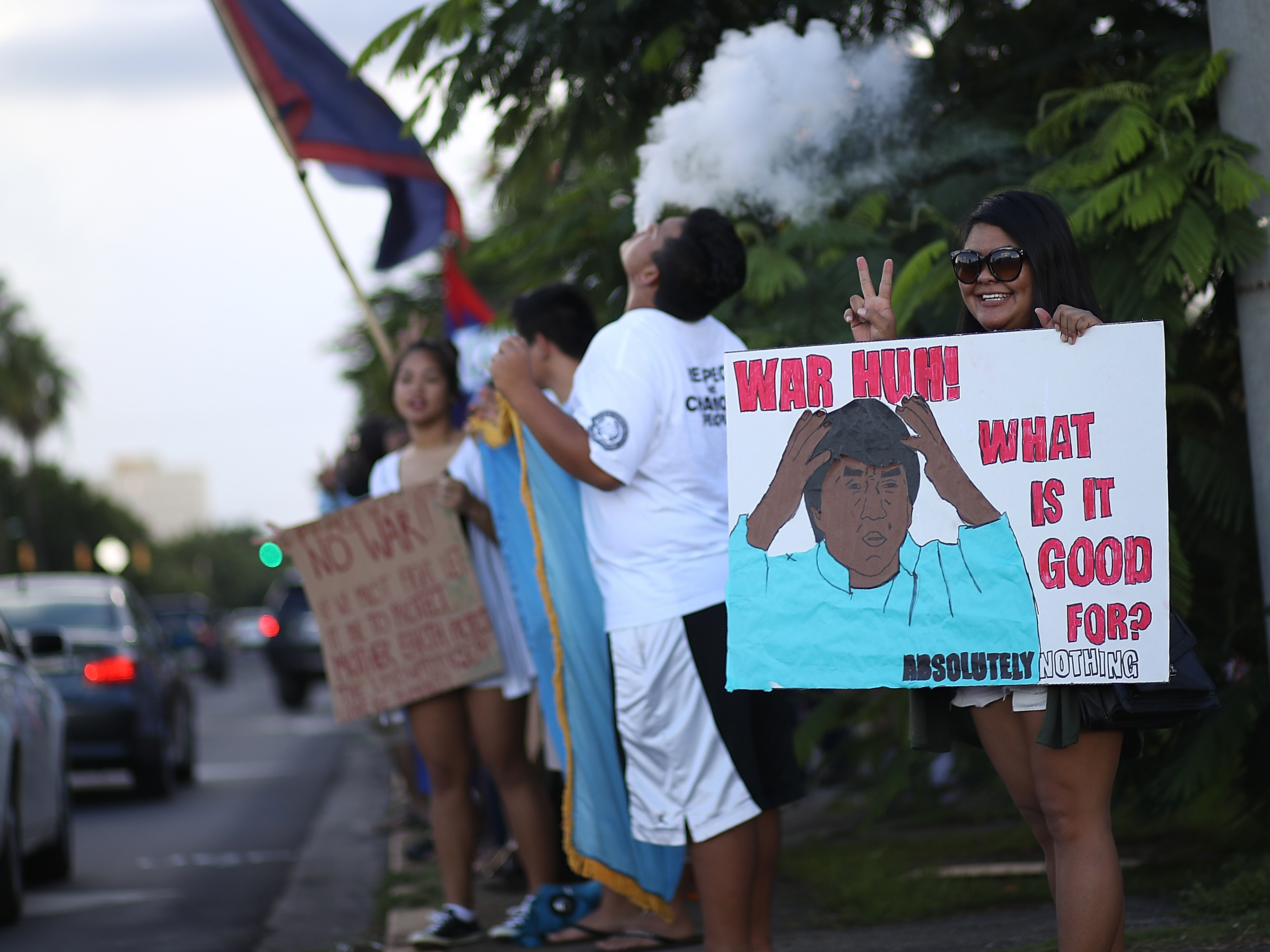 As the date for North Korea's missile launch toward Guam approached, protesters held a peace rally in Hagatna, Guam. On Tuesday, North Korea's regime opted not to launch missiles toward the U.S. territory. (Getty Images,)