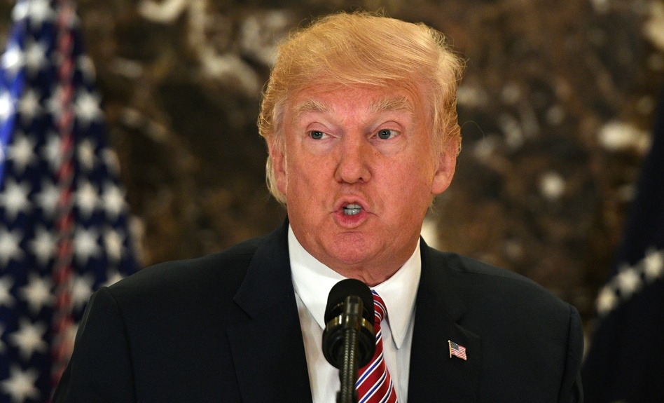 President Trump, in an event about infrastructure, answered reporter questions about his remarks on the violence in Charlottesville, Va. (Jim Watson/AFP/Getty Images)