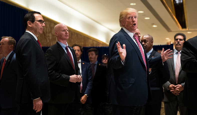 President Trump speaks to reporters in Trump Tower in New York City on Tuesday. (Drew Angerer/Getty Images)