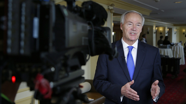 Arkansas Gov. Asa Hutchinson, pictured here during an interview last month, ended the state