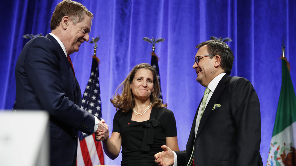 U.S. Trade Representative Robert Lighthizer (left) shakes hands with Canadian Foreign Affairs Minister Chrystia Freeland, accompanied by Mexico's Secretary of Economy Ildefonso Guajardo, after they spoke at a news conference Wednesday at the start of NAFTA renegotiations in Washington, D.C. (Jacquelyn Martin/AP)
