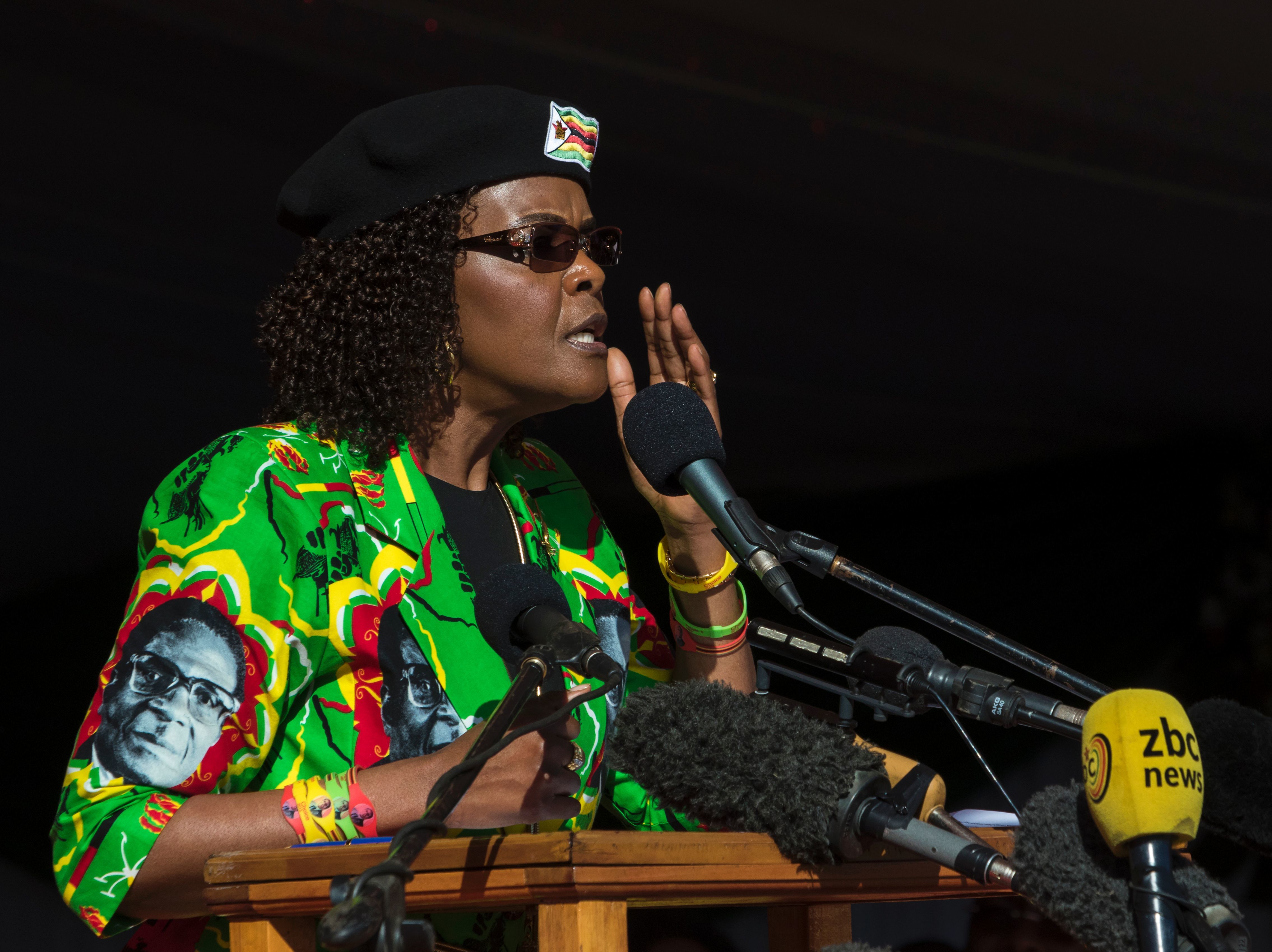 South Africa granted diplomatic immunity to Zimbabwean first lady Grace Mugabe after she was accused of assaulting a young woman at a Johannesburg hotel. Above, Mugabe addresses a youth rally in June. (AFP/Getty Images)