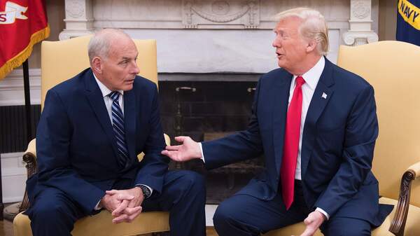 President Trump speaks with newly sworn-in White House chief of staff John Kelly at the White House on July 31. Kelly is one of four former generals who were appointed to top administration positions.