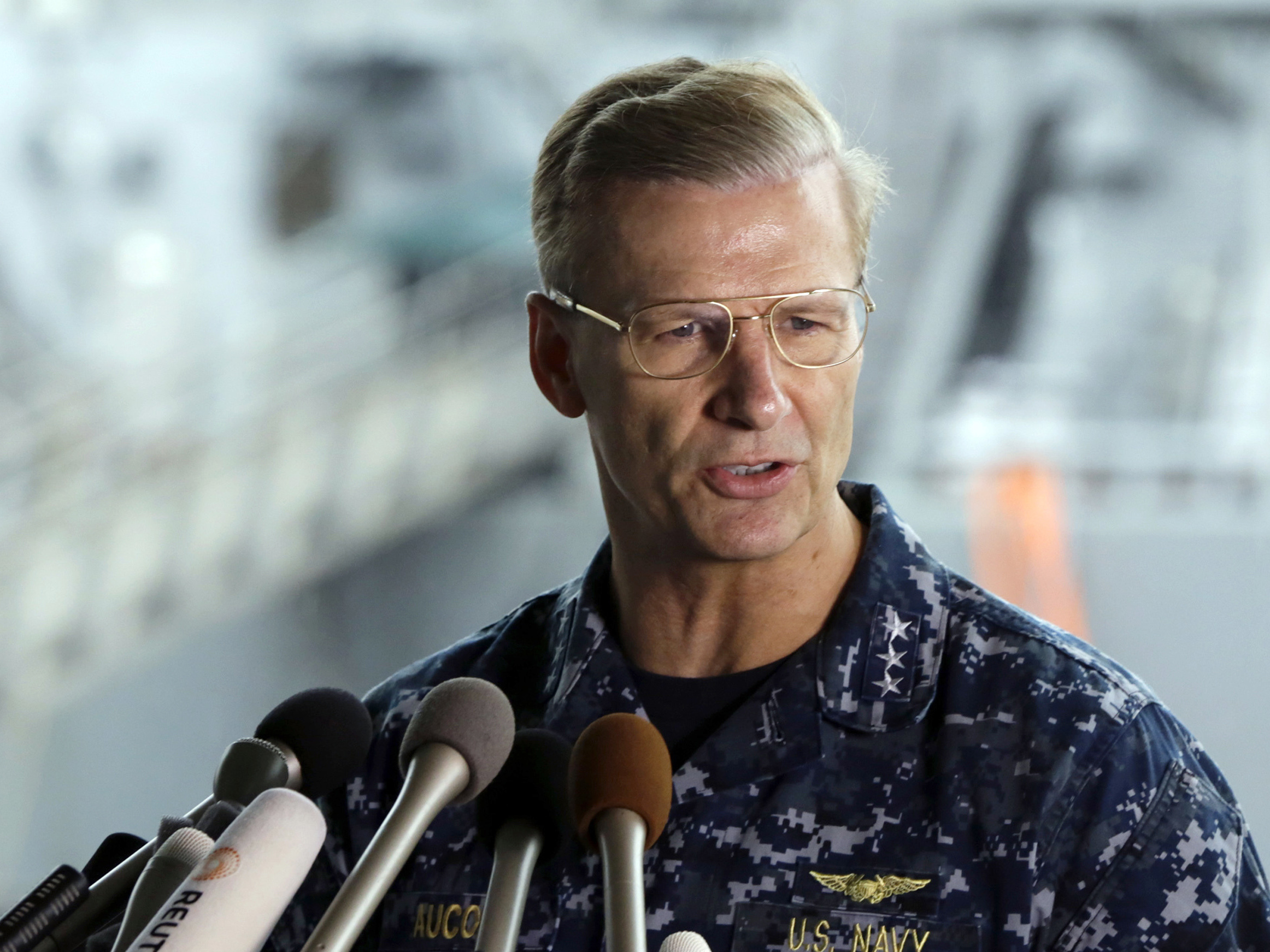 U.S. Navy Vice Adm. Joseph Aucoin, commander of the U.S. 7th Fleet, speaks during a news conference in June after the USS Fitzgerald collided with a container ship off Japan.