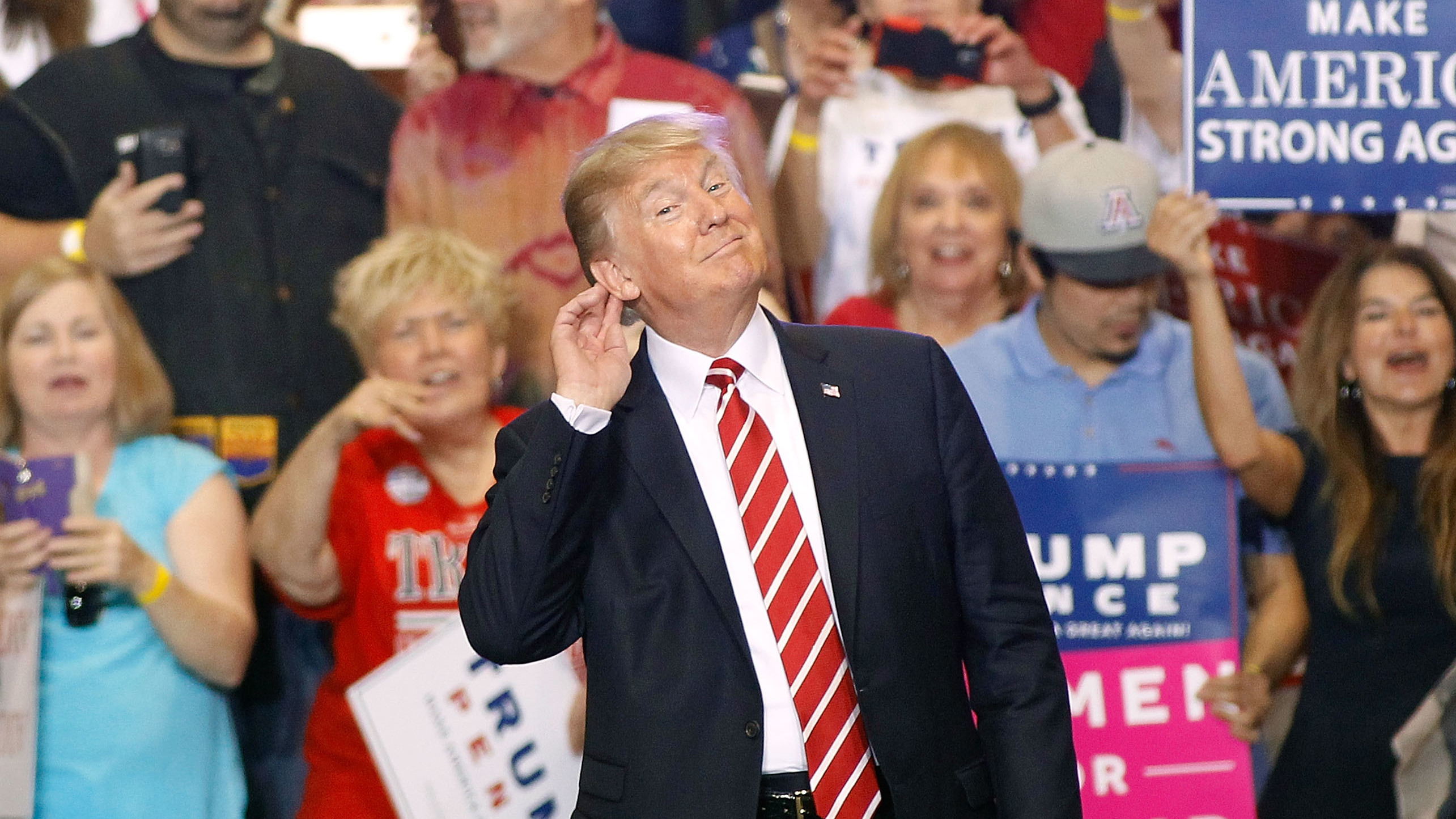 President Trump gestures during a rally at the Phoenix Convention Center Tuesday night. (Getty Images)