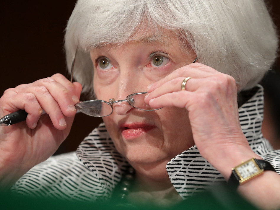 Federal Reserve Chair Janet Yellen testifies before the Senate Banking Committee in July. President Trump has given mixed signals about whether he will re-appoint her when her term as chair expires in February. (Chip Somodevilla/Getty Images)