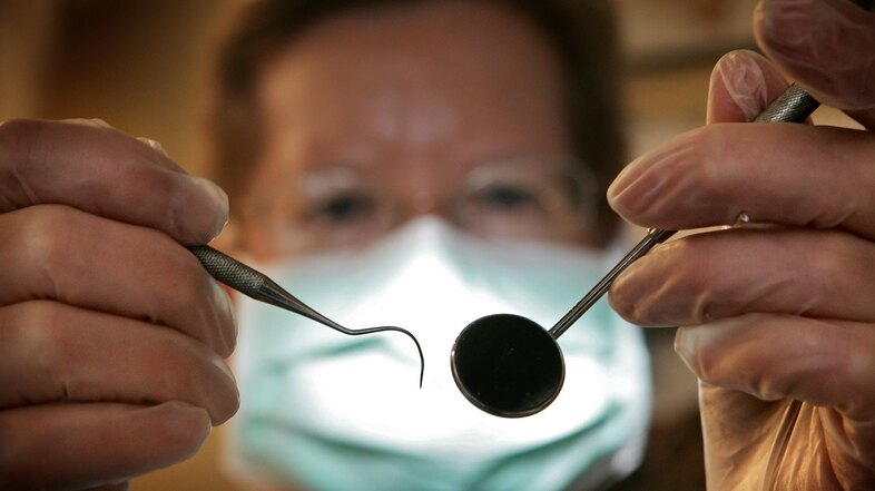 Dan Gilbert says we're not great at predicting how much we will enjoy an experience in part because we fail to consider all of the details. We think a visit to the dentist will be terrible, but we're forgetting about the free toothbrush, the nice chat with the dental hygienist and the magazines in the waiting room. (Peter Macdiarmid/Getty Images)