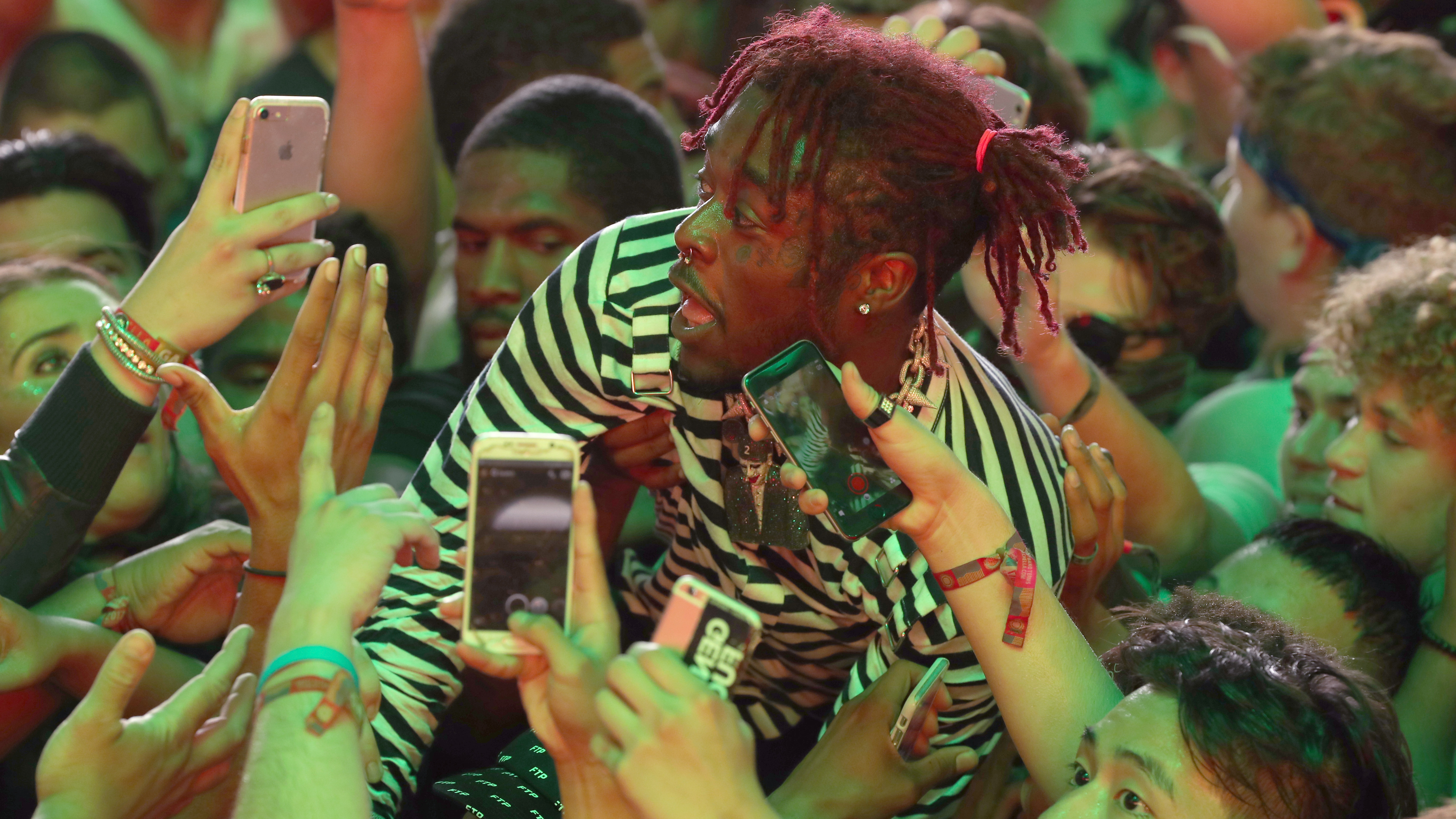 Lil Uzi Vert, caught surfing the crowd at Coachella last April, released his album <em>Luv Is Rage 2</em> last week. (Getty Images for Coachella)