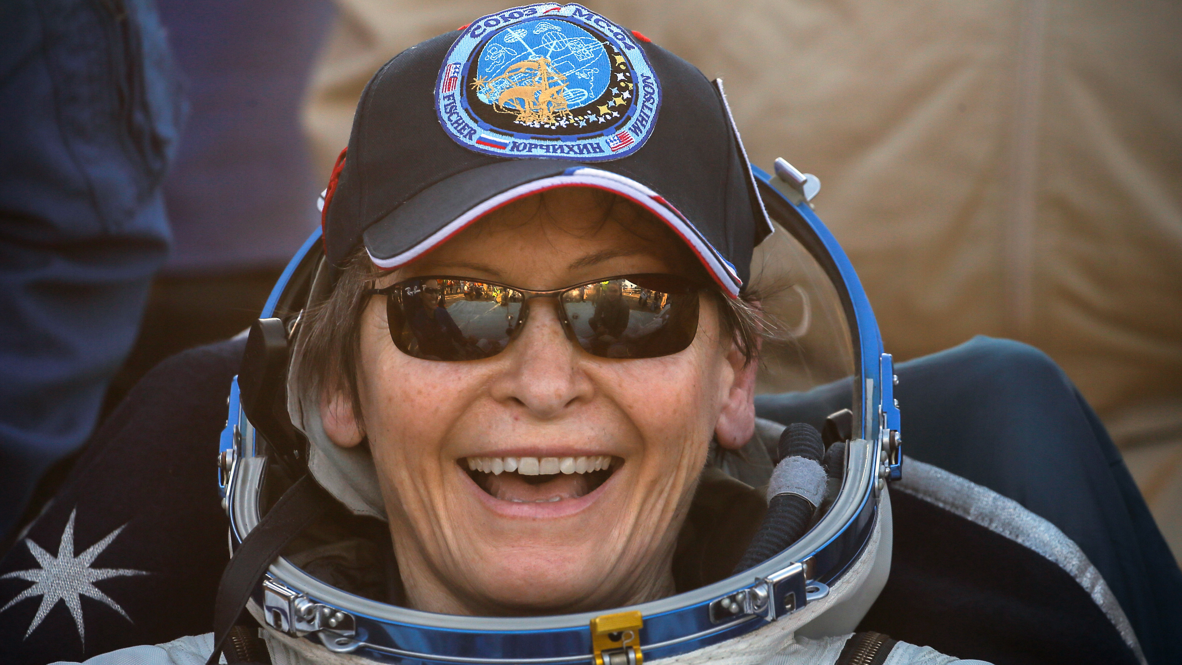 Astronaut Peggy Whitson smiles after landing in Kazakhstan, wrapping up a record 665 days in space for an American.