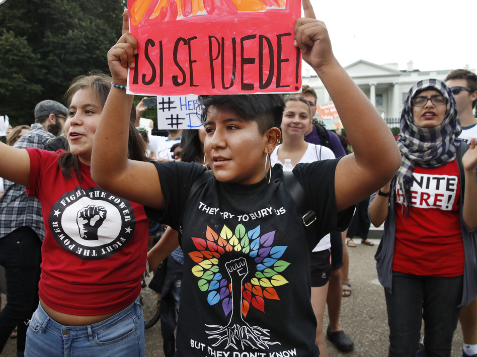 Juliana Torres (left), 16, and Micaela Lattimer, 16, both of Baltimore, rally in support of Deferred Action for Childhood Arrivals, known as DACA, outside the White House on Tuesday. (Jacquelyn Martin/AP)