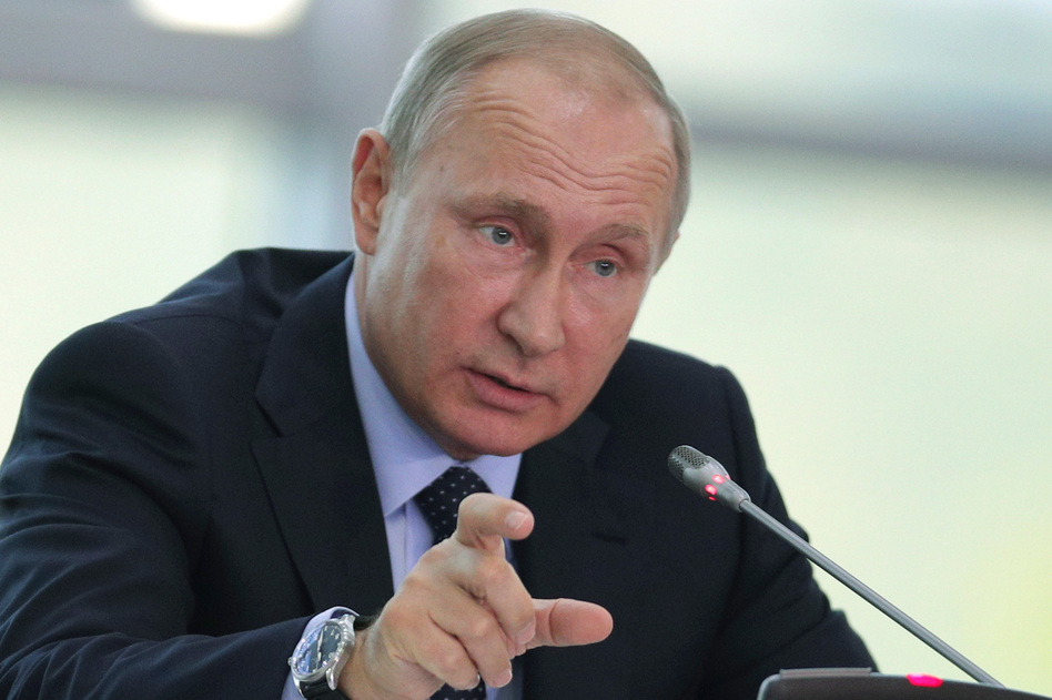 Russian President Vladimir Putin, infuriated with the sanctions of the Magnitsky Act, retaliated by imposing a ban on Russian adoptions. (Sergei Bobylev/TASS News Agency Pool Photo via AP)