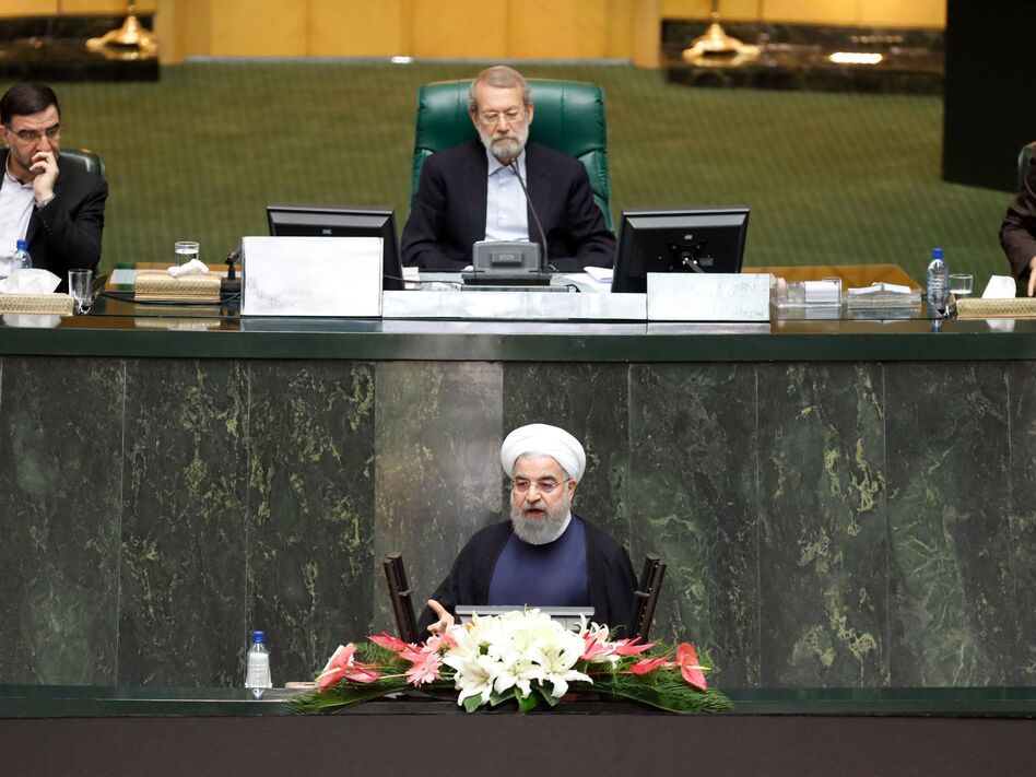 President Hassan Rouhani addresses Iran's Parliament on Aug. 20. He said the top foreign policy priority for his new government would be to protect the nuclear deal. (STR/AFP/Getty Images)
