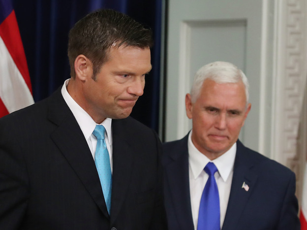Kansas Secretary of State, Kris Kobach, left, and Vice President Pence at the first meeting of the Presidential Advisory Commission on Election Integrity, in July. (Image credit: Getty Images)