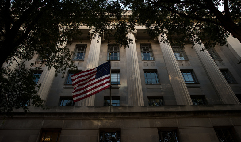 An exterior view of the U.S. Department of Justice headquarters in Washington, D.C., in July. Members of the DOJ were among those who attended a roundtable on Thursday about the criminal justice system and helping ex-inmates re-enter into society. (Drew Angerer/Getty Images)