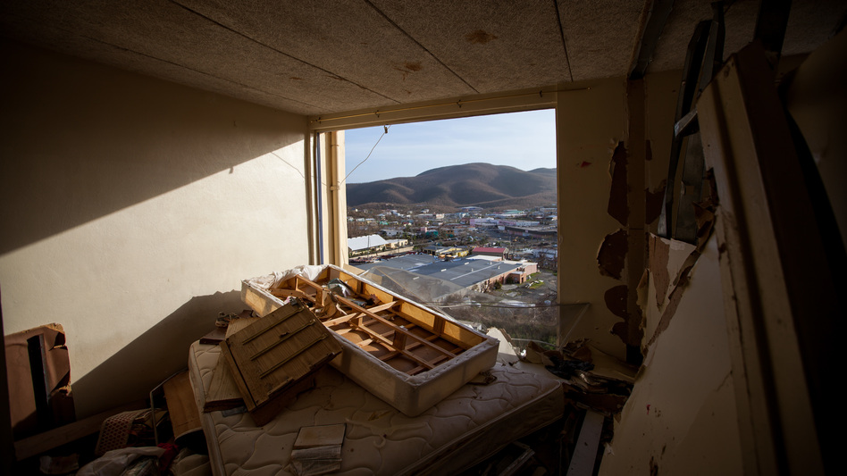 The sun glares down on a severely damaged apartment unit in a St. Thomas high-rise on Tuesday. Many residents say they lost everything to the Category 5 storm, and days later they're still grappling with how to respond to the rampant destruction. (Michael Nagle/Bloomberg via Getty Images)