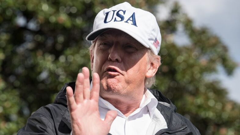 President Trump speaks to the press at the White House, capping off a day in which he had made shifting statements and tweets over the proposed DACA deal. (Nicholas Kamm/AFP/Getty Images)