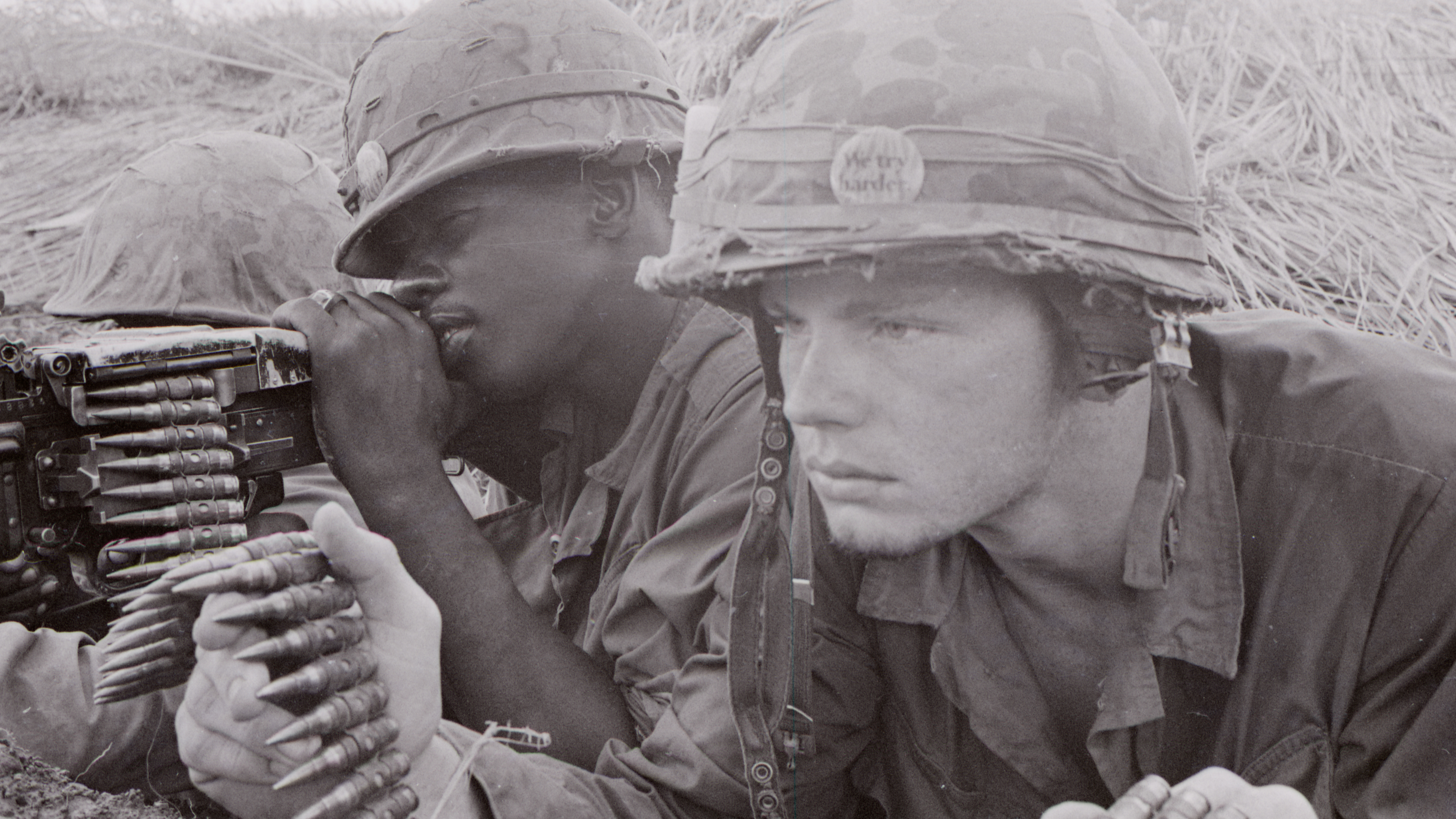 Ken Burns' 10-part, 18-hour series premiers Sunday. Above, an American Marine machine gun crew is poised for action. (PBS)