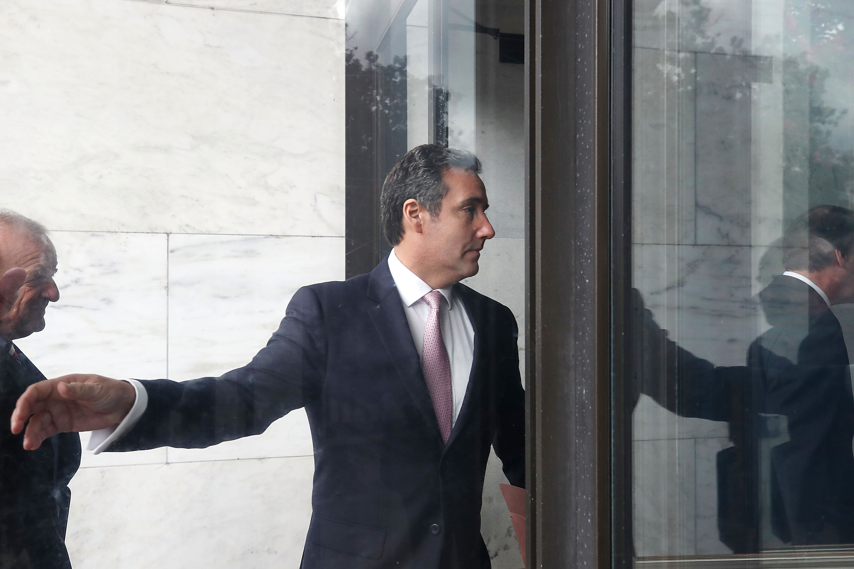 Michael Cohen, President Trump's personal lawyer, arrives at the Hart Senate Office Building to be interviewed by the Senate Intelligence Committee on Tuesday. (Getty Images)