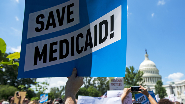 Protesters rallied against Medicaid cuts in front of the U.S. Capitol in June. Medicaid is the nation