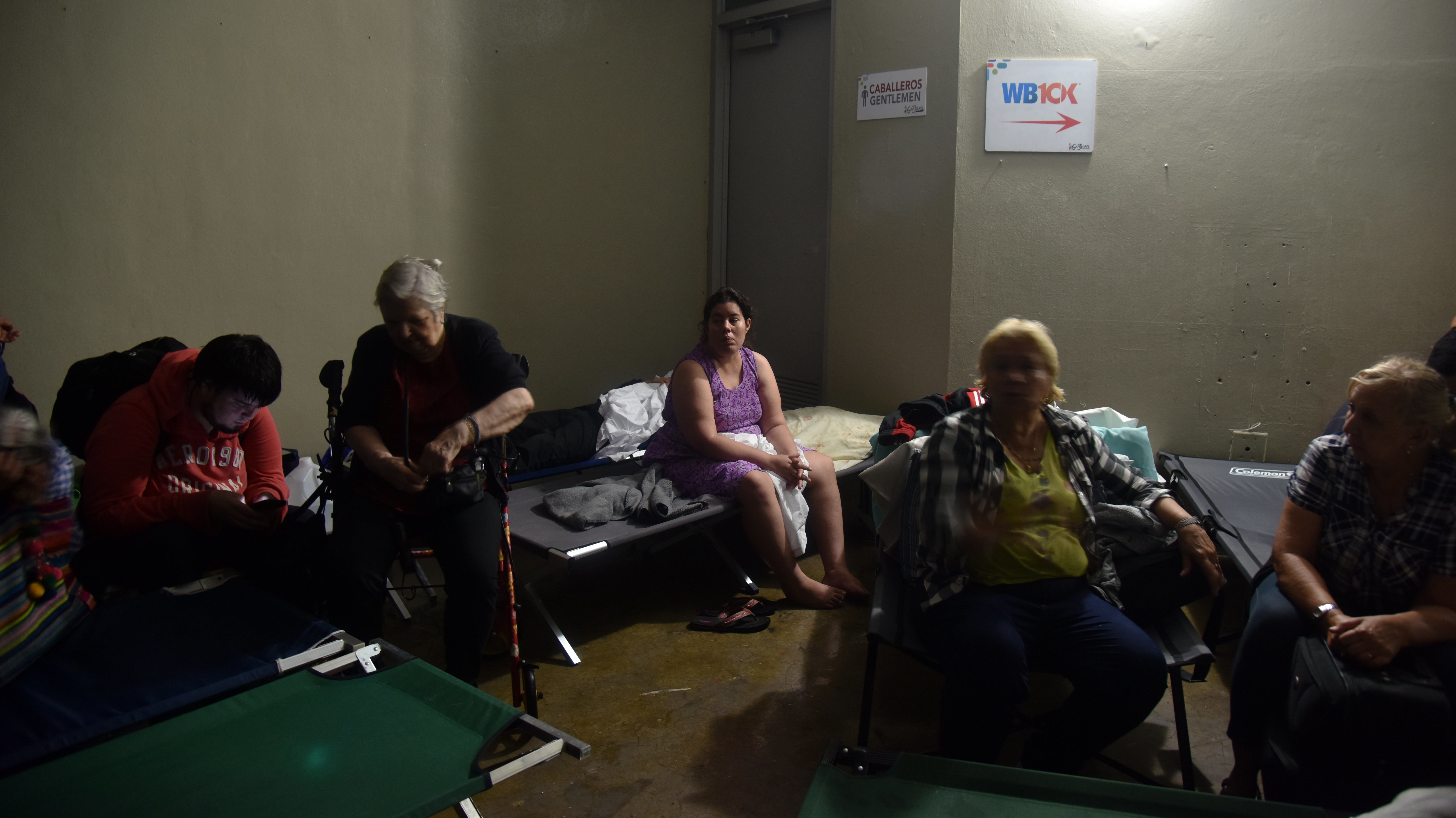 As Hurricane Maria ravaged Puerto Rico Wednesday, people took shelter at Roberto Clemente Coliseum in San Juan. (AFP/Getty Images)