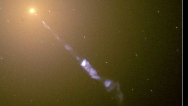 A jet emanating from galaxy M87 can be seen in this July 6, 2000, photo taken by the Hubble Space Telescope.