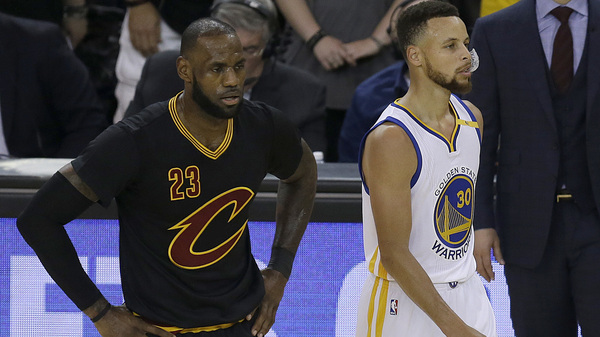 Cleveland Cavaliers star LeBron James (left) defended Golden State Warriors guard Stephen Curry in a tweet that has been liked more than a 1.1 million times and retweeted more than a half million times.