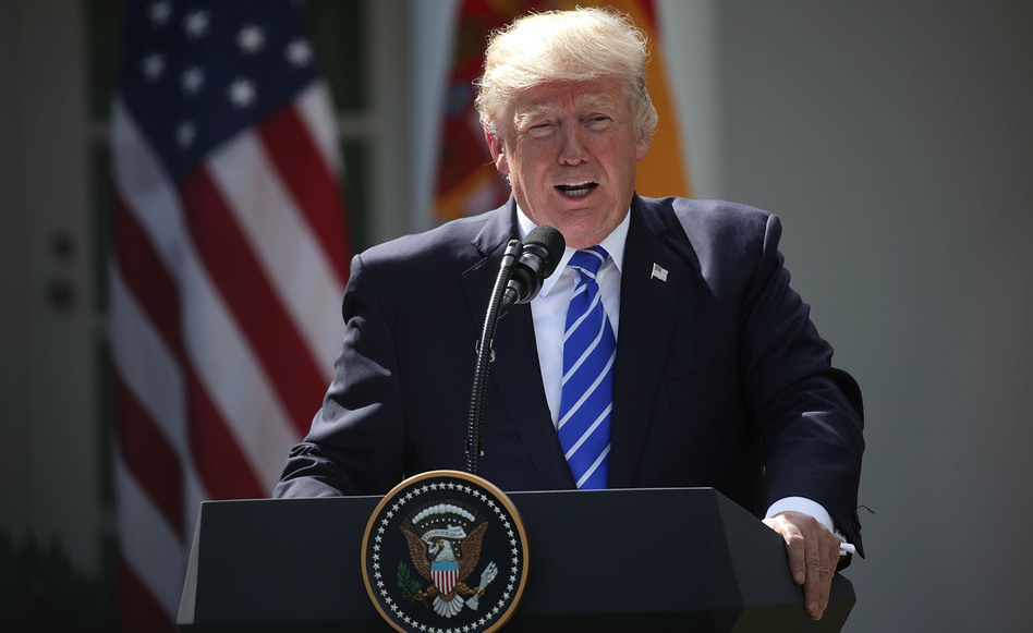President Trump speaks during a joint news conference with Spanish Prime Minister Mariano Rajoy at the Rose Garden of the White House on Tuesday. (Alex Wong/Getty Images)