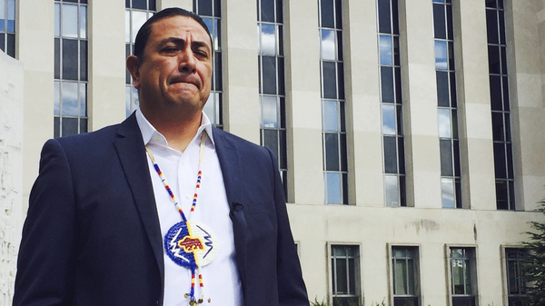 Dave Archambault, chairman of the Standing Rock Sioux Tribe, stands outside court in Washington in October 2016, where appeals court judges heard his tribe