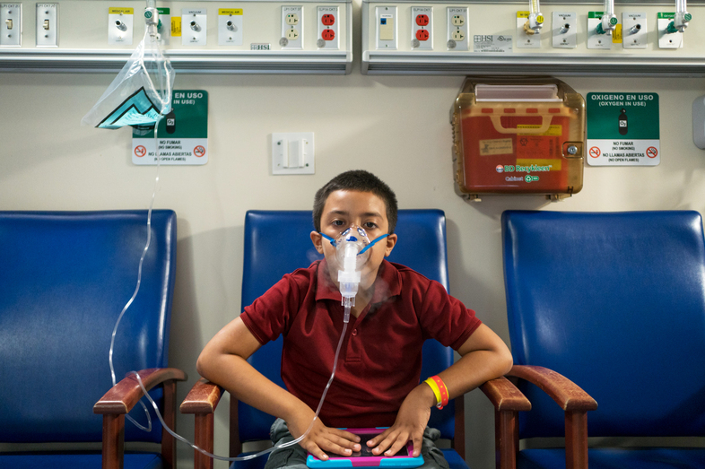 Jose Rolon Rivera, 7, receives medication for his asthma at the San Jorge Children's Hospital in Puerto Rico. The hospital only has enough fuel to power its emergency generators until Saturday, an administrator says. (Angel Valentin for NPR)