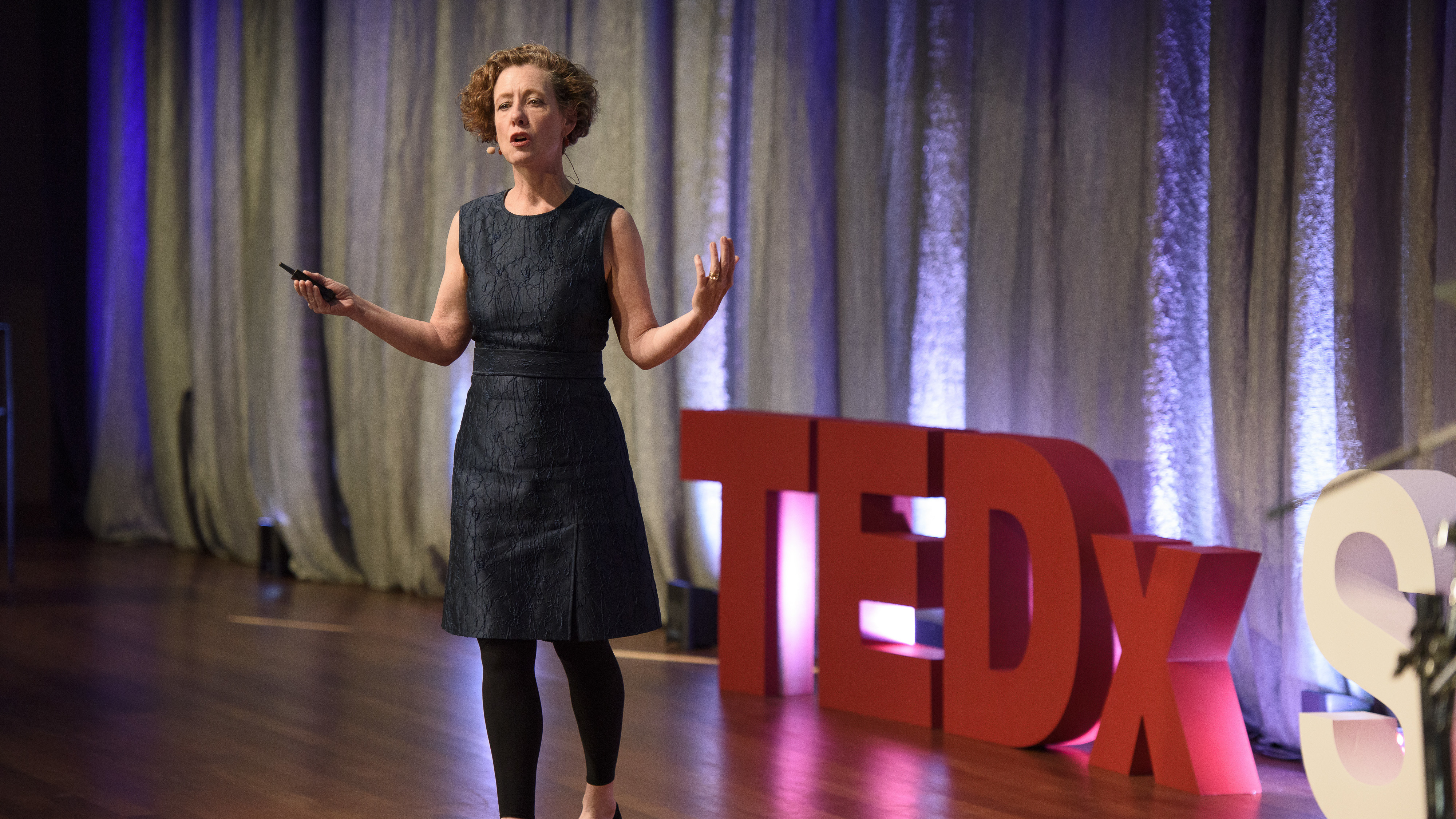 Mary Ellen Hannibal on the TEDx stage