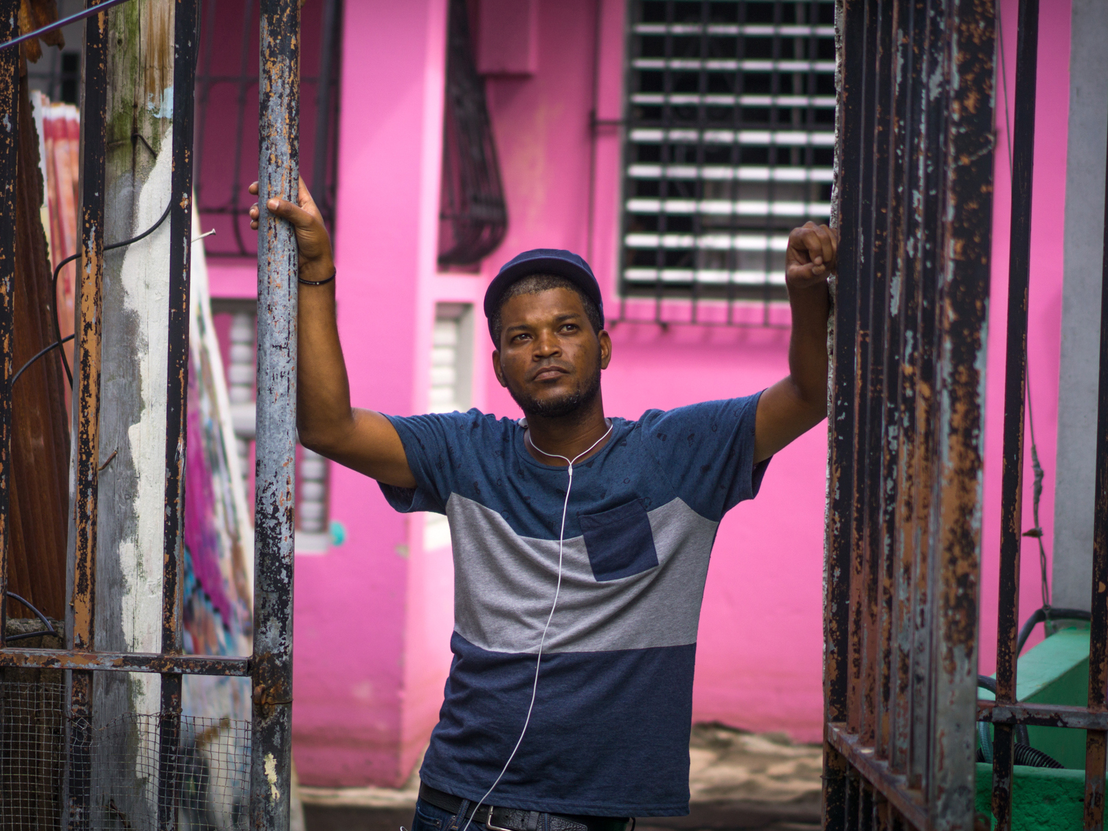 Pedro Galindez Casillas looks at a destroyed house in the Playita neighborhood. Just five percent of the island has working electricity from the hurricane-devastated grid. (Angel Valentin for NPR)