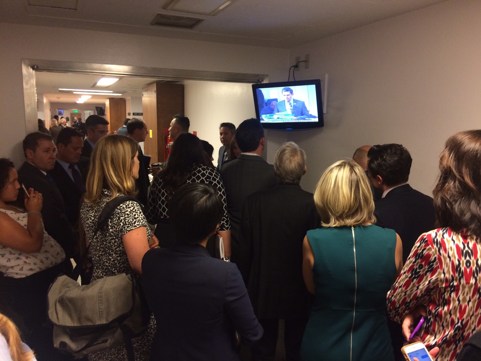 Drug lobbyists and consumer health advocates fill the halls of the state Capitol in September to see how Assembly members vote on a controversial drug price transparency bill. (Tam Ma/Courtesy of Health Access California)