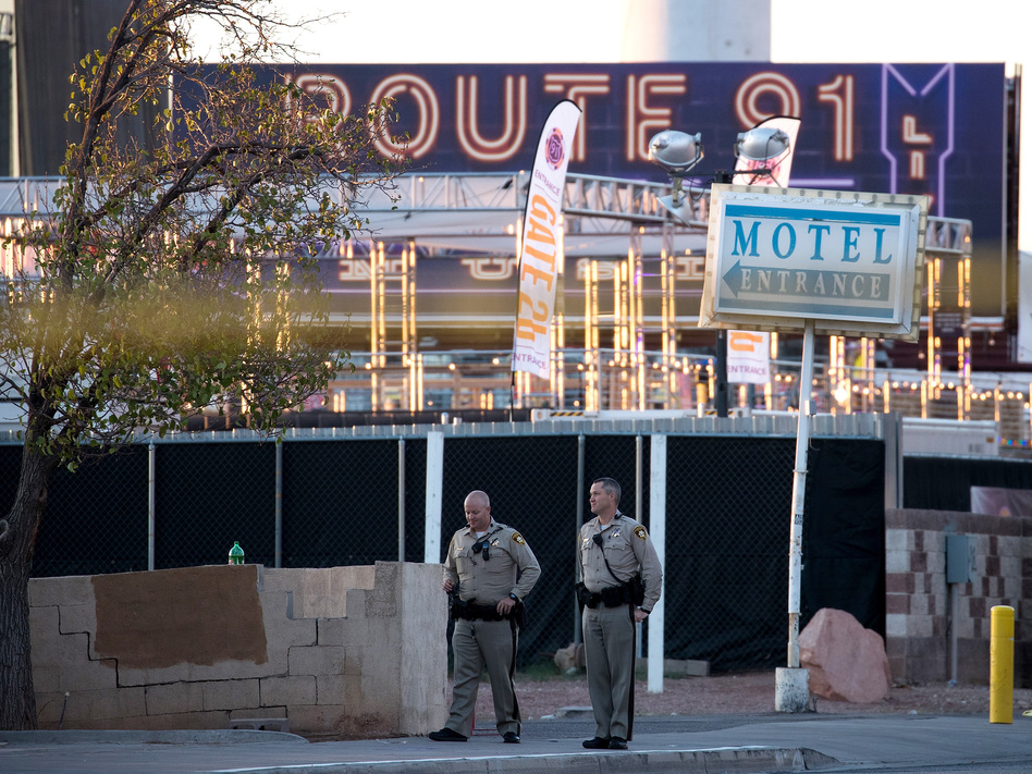 Law enforcement officers stand guard at one of the entrance points to the Las Vegas concert venue where Sunday night's mass shooting took place. The massacre was one of the deadliest mass shooting events in modern U.S. history. (Drew Angerer/Getty Images)
