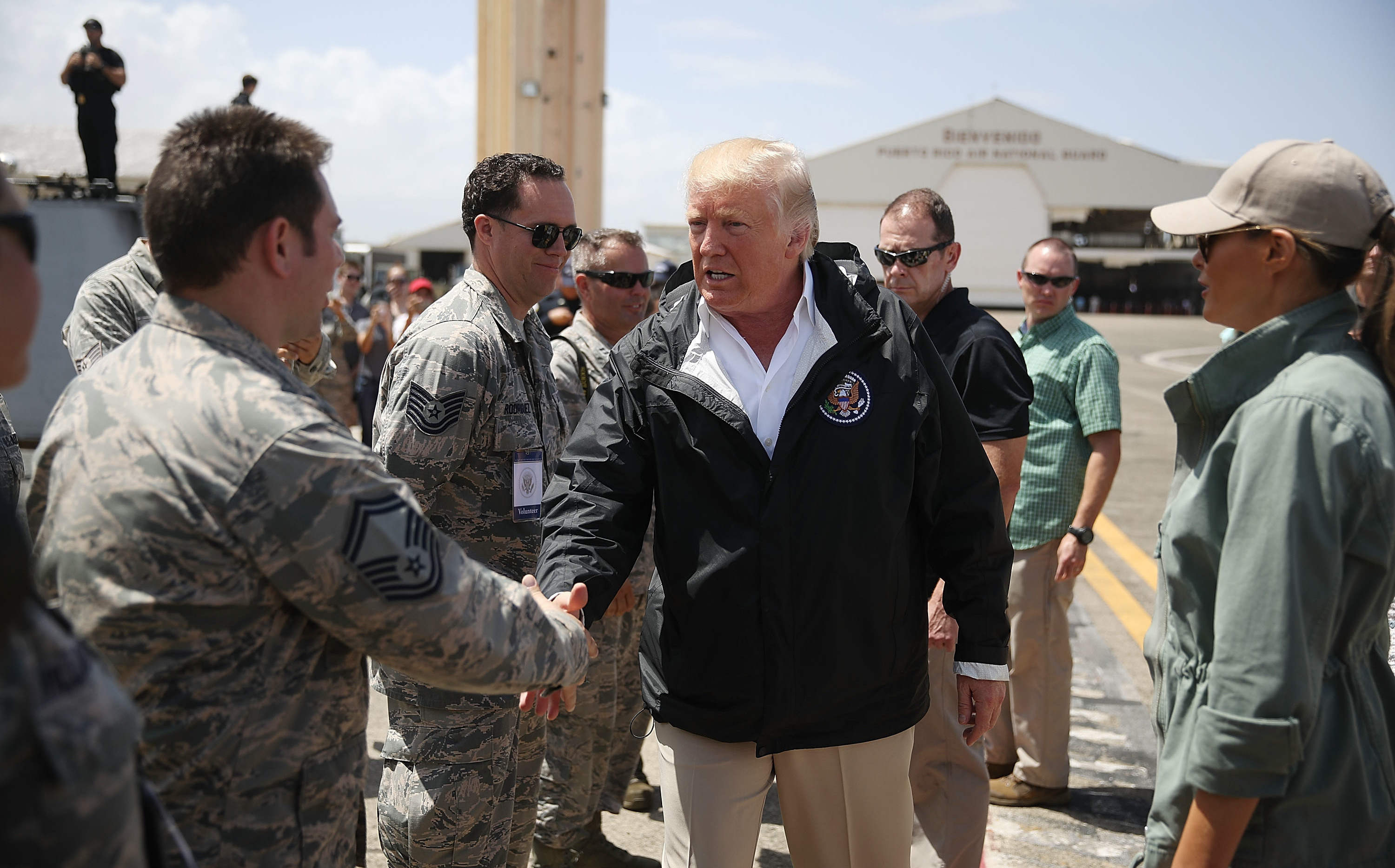 President Trump greets members of the U.S Air Force at the Muñiz Air National Guard Base in Carolina, Puerto Rico. Trump visited the island on Tuesday in the aftermath of Hurricane Maria. (Getty Images)
