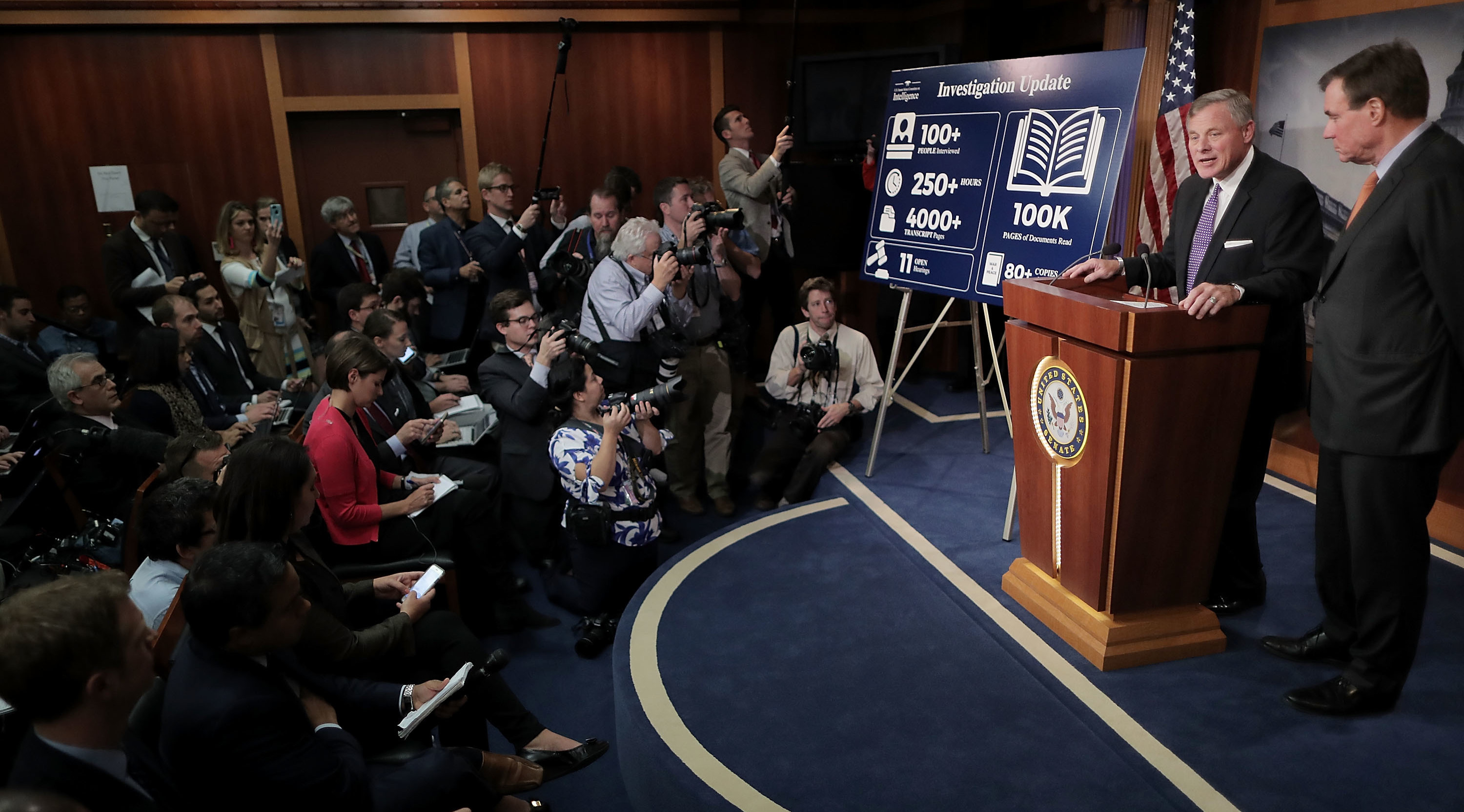 Senate Intelligence Committee Chairman Richard Burr, R-N.C. (left), and committee Vice Chairman Mark Warner, D-Va., discuss the status of the committee's inquiry into Russian interference in the 2016 presidential election, at the U.S. Capitol on Wednesday.