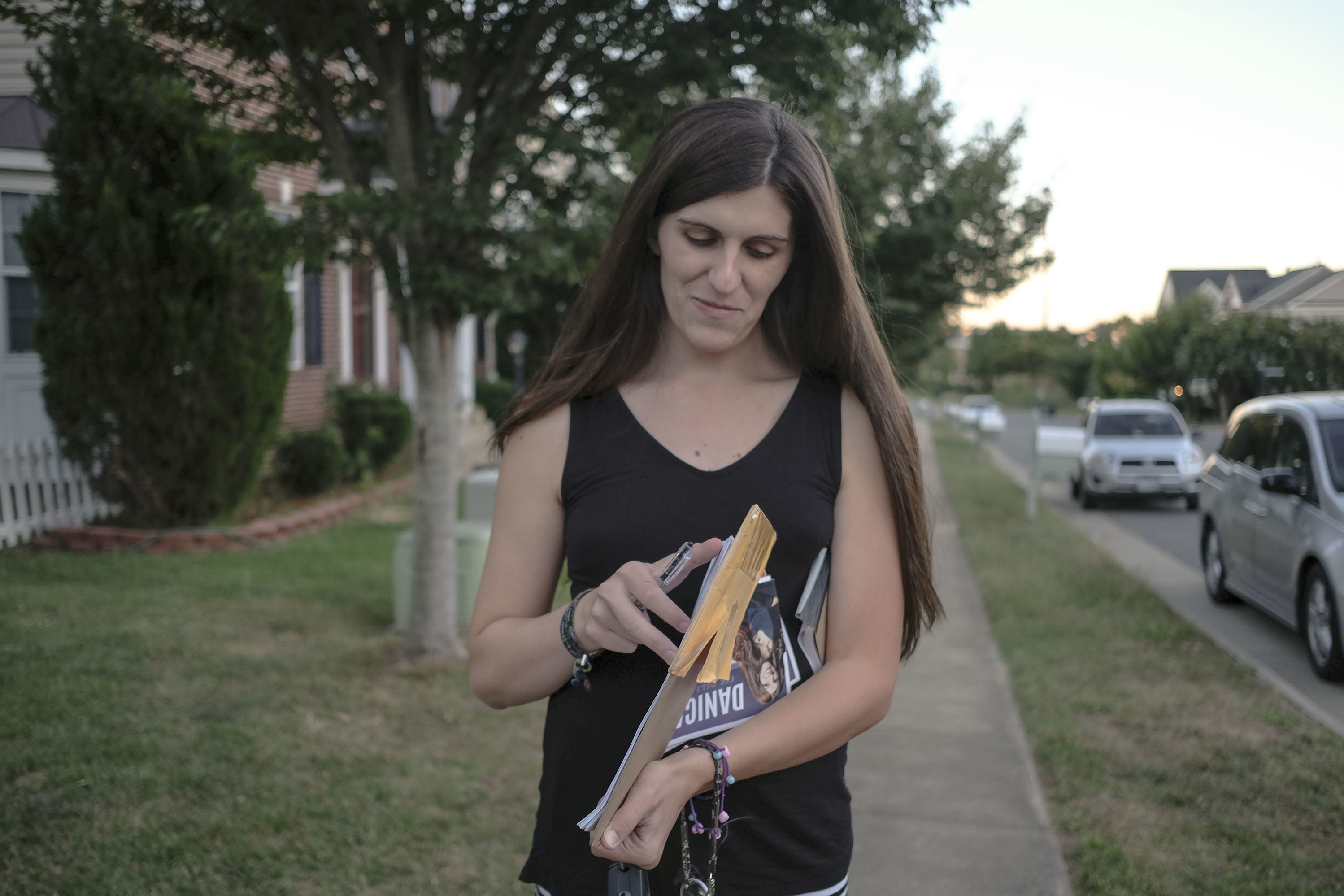 Danica Roem, democratic candidate for Virginia state legislature, canvasses through a neighborhood in Manassas, Va., last month. (Gabriella Demczuk for NPR)
