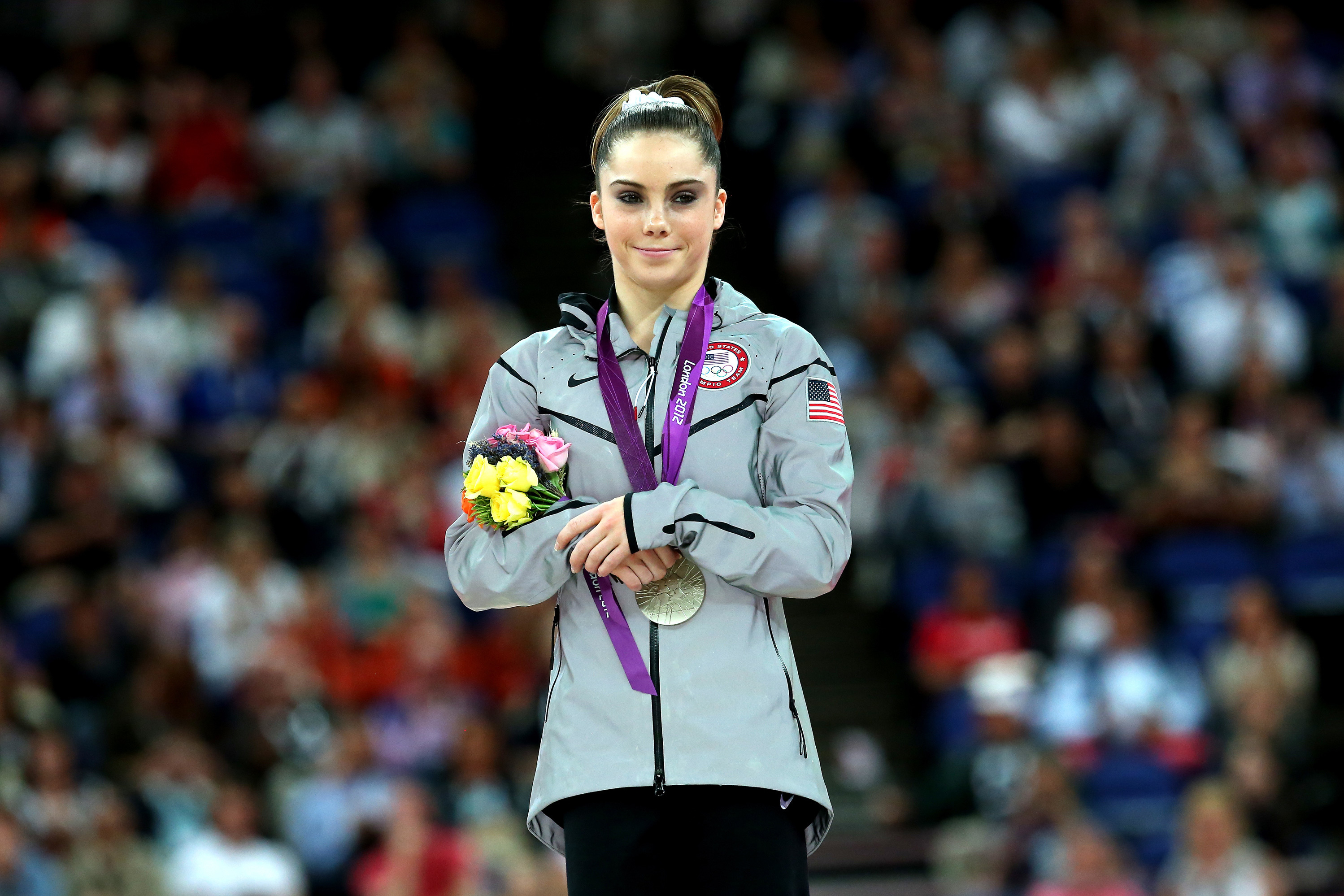 McKayla Maroney stands on the podium at the 2012 Olympic Games in London. She says a team doctor molested her for years, including during the Olympics. (Getty Images)