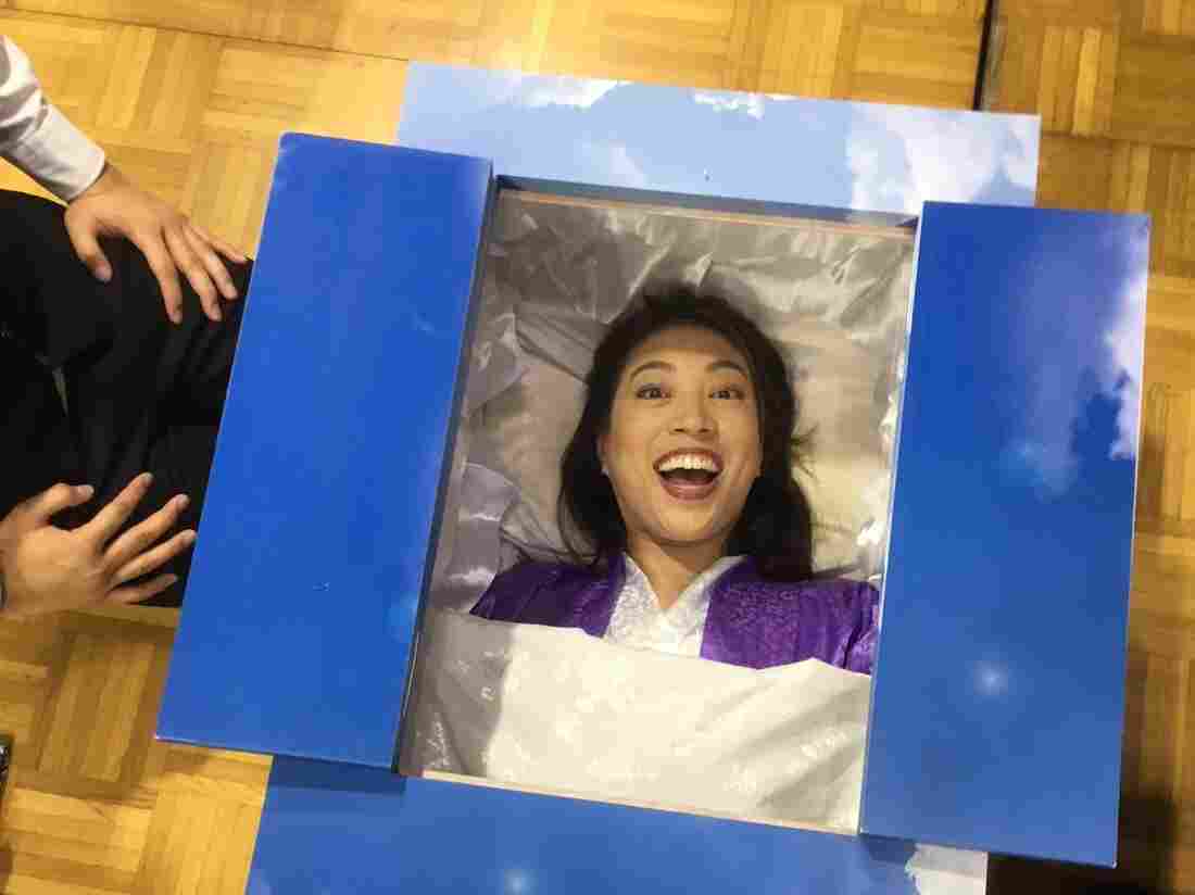 Elise Hu in her golf coffin