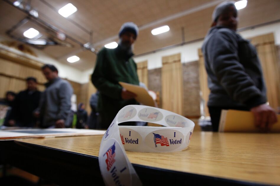A roll of "I Voted" stickers sits on a table at an elementary school during the U.S. presidential election on November 8, 2016 in Dearborn, Mich. (Jeff Kowalsky/AFP/Getty Images)